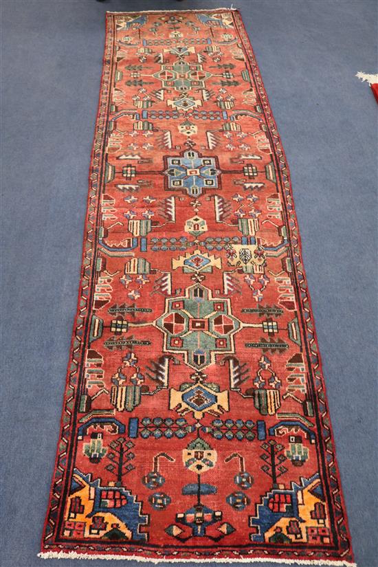 A Hamadan rug, 275cm x 78cm